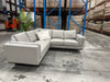 Magnolia leather corner lounge in warehouse