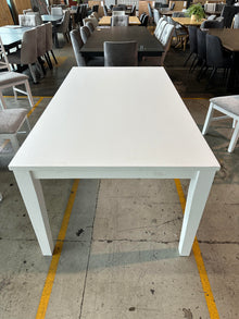  Summer Dining Table Finished in Matt White Timber